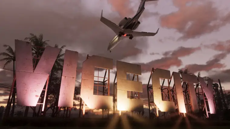 The Vice City sign at sunset with a plane flying overhead